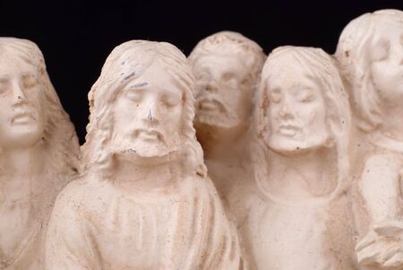 Detail of worn vintage last supper sculpture with focus on Jesusの写真素材