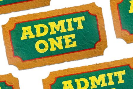 Close-Up of green,yellow and orange crumpled General Admission Tickets isolated over a white backgroundの写真素材