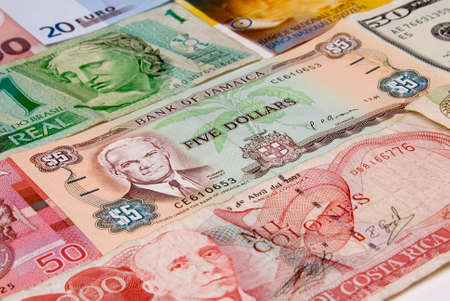 assorted international paper money close upの写真素材