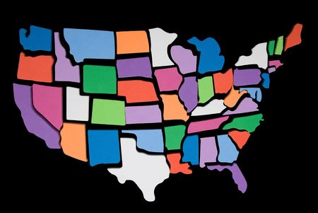 textured USA map puzzle outline over a black backgroundの写真素材