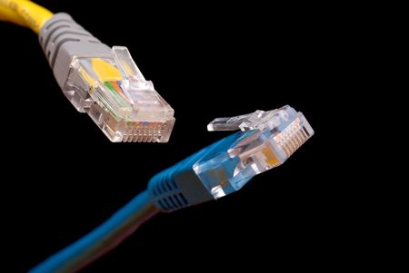Blue and yellow lan (RJ-45) computer network Cables isolated on black