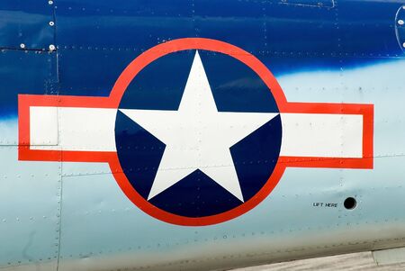 US Airforce Insignia on Fusalodge of Plane with plane cropped outの写真素材