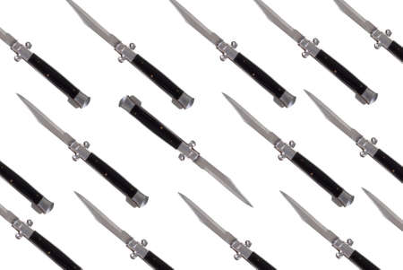 Switchblade knifes open isolated over a white background