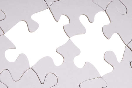 Puzzle missing pieces on a white background