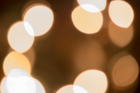 dark background with bright white lights blurringの写真素材