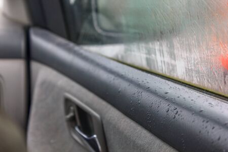 car condensation on passenger door window