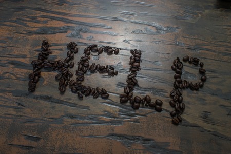 Help written out on a brown stained boardの写真素材