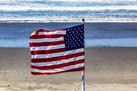 american flag blowing in the wind