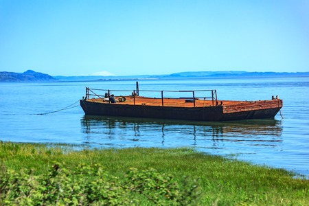 lake with a large wooden platformの写真素材