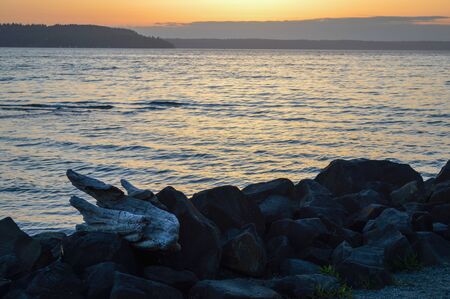 coastline seawall made of large stacked boulders