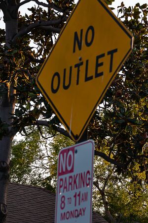 street sign posting sign limits and road situation for parking and road lengthの写真素材