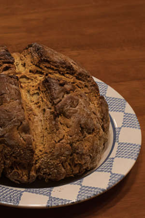 round bread loaf fresh out of the ovenの写真素材