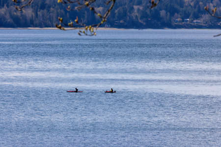 a pair of kayaks out in the puget sound