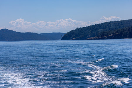 Coastal Islands and Wake Trails on Bright Summer Dayの写真素材