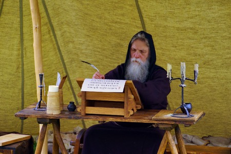 Monk Nestor the Chronicler. Moscow, Russia - June 23, 2013: History Festival "Times and Epochs 2013" in Kolomenskoyeのeditorial素材