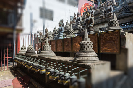 Buddhist statue in Gangaramaya Temple. Sri Lankaのeditorial素材