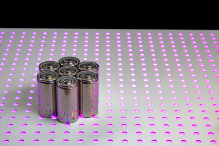 New modern lithium-ion batteries with increased capacity. A prototype of new batteries on a laboratory tableの写真素材