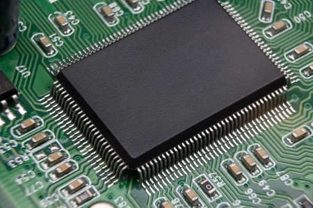 Details of electronic board. Close-up of electronic circuit board with SMD components and chipの写真素材
