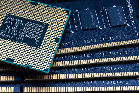 Powerful processor against the background of DDR DIMM RAM modules. computer upgrade kit.