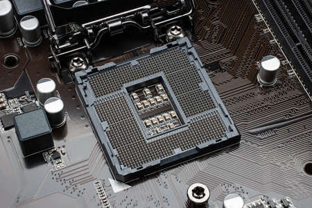 Close-up of an open slot for installing a processor. Modern motherboard before installing the processor.の写真素材