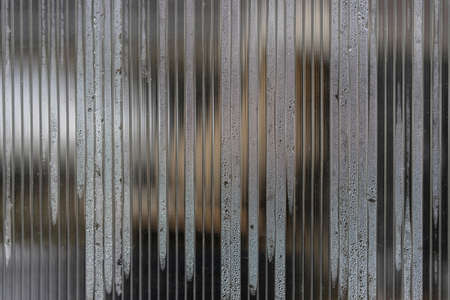Close-up of a polycarbonate greenhouse wall. Porous polycarbonate sheet with condensation drops...
