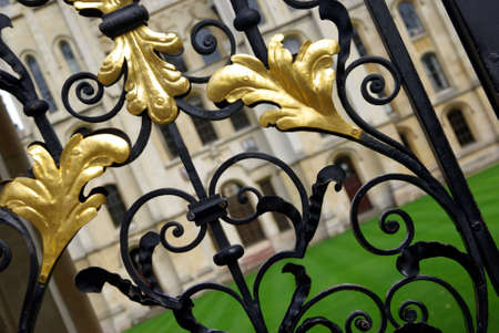 Ornamented fence detail in Oxford at the entrance of a college.の写真素材