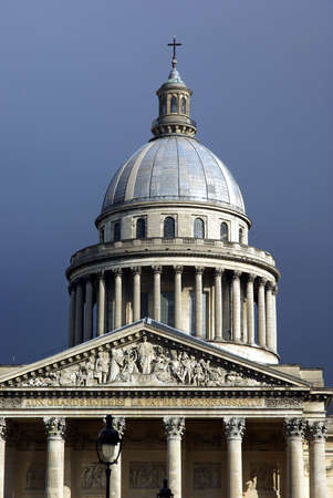 View of the Pantheon in Paris with bright light and dark skyの写真素材