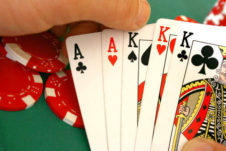 Close-up view on a strong full house in hands.のeditorial素材