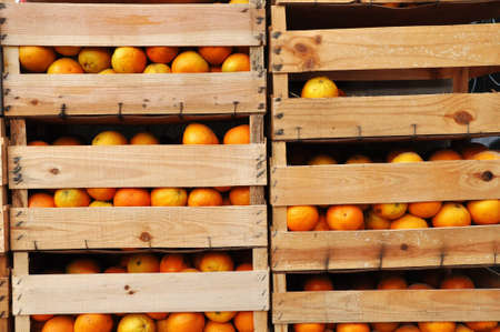 Image of wooden crates full of oranges.の写真素材