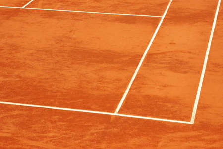 Detail view of the lines of a tennis court in clayの写真素材