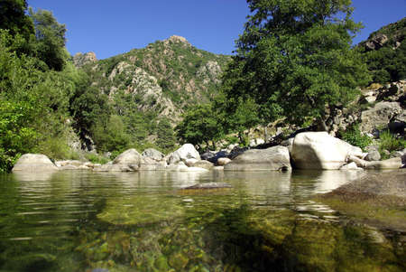 View of a mountain from a river in Corsica.の写真素材
