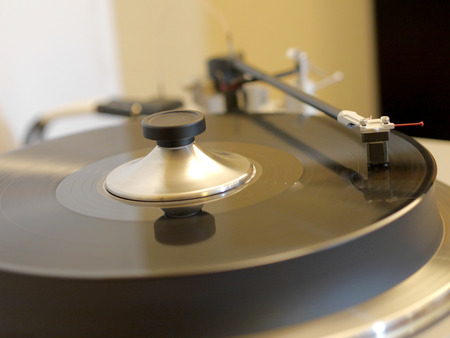 Audiophile HiFi turntable player with musical vinyl record.の写真素材
