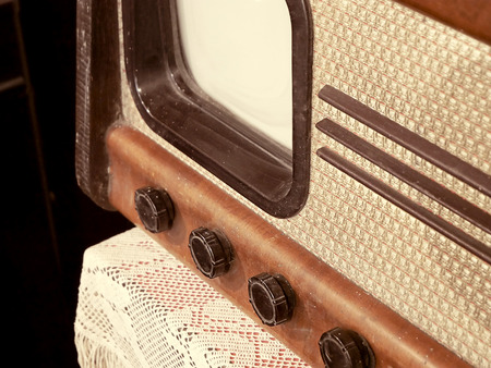Retro old television on table. Toned style photo.の写真素材