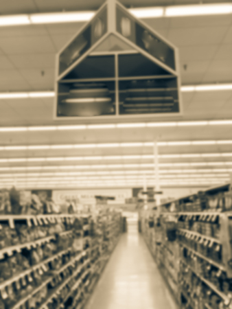 Defocused snack time treats aisle on display with price tags at department.の写真素材