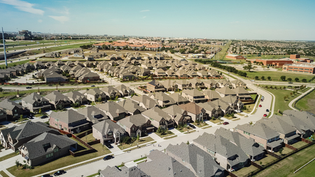 Top view new development area with residential houses, highway aの写真素材