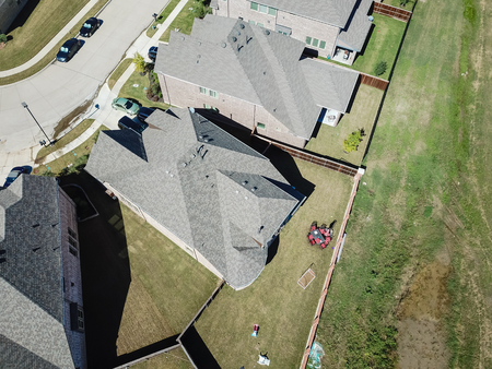 Top view new residential houses neighborhood with garden suburbsの写真素材