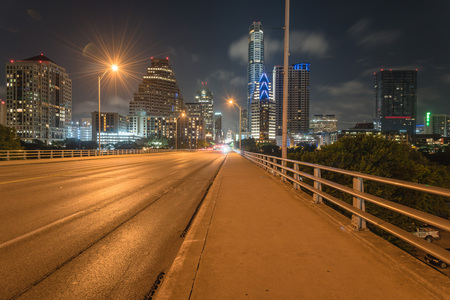 Austin modern skylines and state capitol building at nightの写真素材