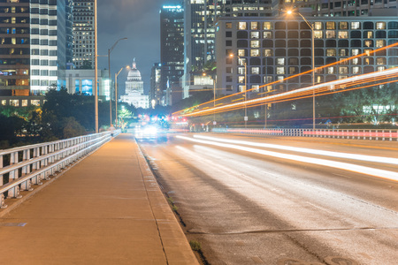 Austin modern skylines and state capitol building at nightの写真素材