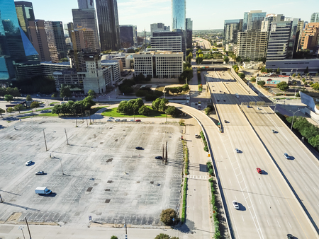 Top view vacant parking lots with downtown Dallas skylinesの写真素材