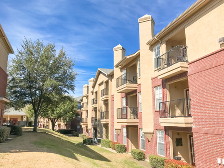 Apartment building with chimney and steep backyard in Texas, Americaの写真素材