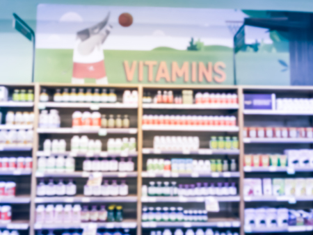 Vintage tone blurred motion vitamin and supplement department at grocery store in Americaの写真素材