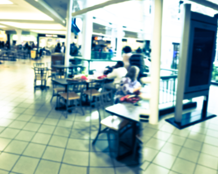 Blurred motion public music show at shopping mall in Texas, America. Crowed audience watching free performance under the glass dormの写真素材