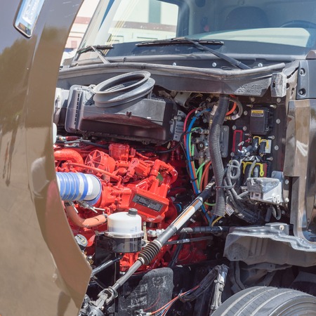 Fully-electric class 6 delivery truck open hood with engine inside
