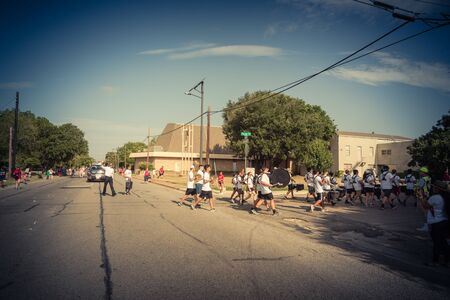 Team of high school drummers on street at Independence Day celebrationのeditorial素材