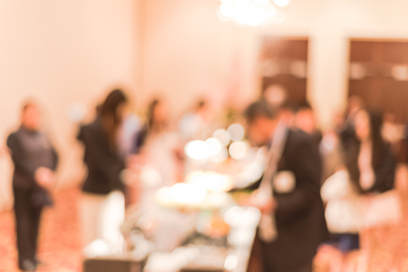 Blurry background diverse people choosing foods at hotel buffet catering in Americaの写真素材