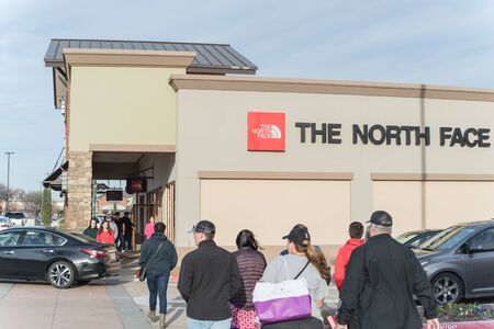 Customers walking by The North Face store at outlet shopping in Texas, Americaのeditorial素材