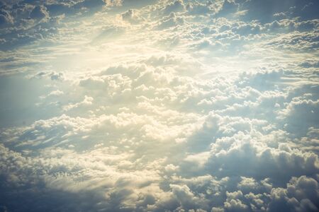 Beautiful and unusual Altocumulus or Cirrocumulus cloud formation seen from airplane window at...