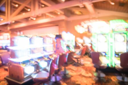 Blurry background typical casino in America with slot machines and themed gameの写真素材