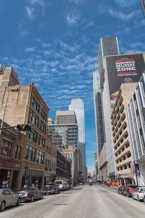 DALLAS, TX, US-MAY 3, 2019: Downtown Dallas with clean street and modern skyscrapers office buildings under cloud blue skyのeditorial素材
