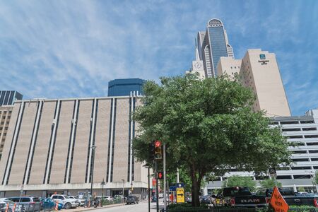 DALLAS, TX, US-MAY 3, 2019: Looking up view of downtown Dallas with dense of modern skyscrapers office buildings under cloud blue skyのeditorial素材